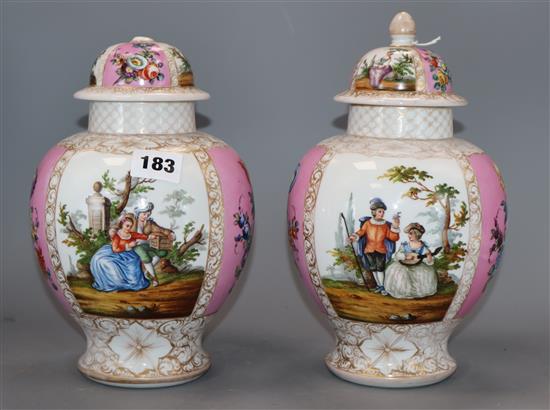 A pair of Dresden vases and covers